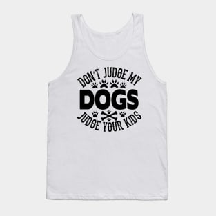 Don't judge my dogs judge your kids Tank Top